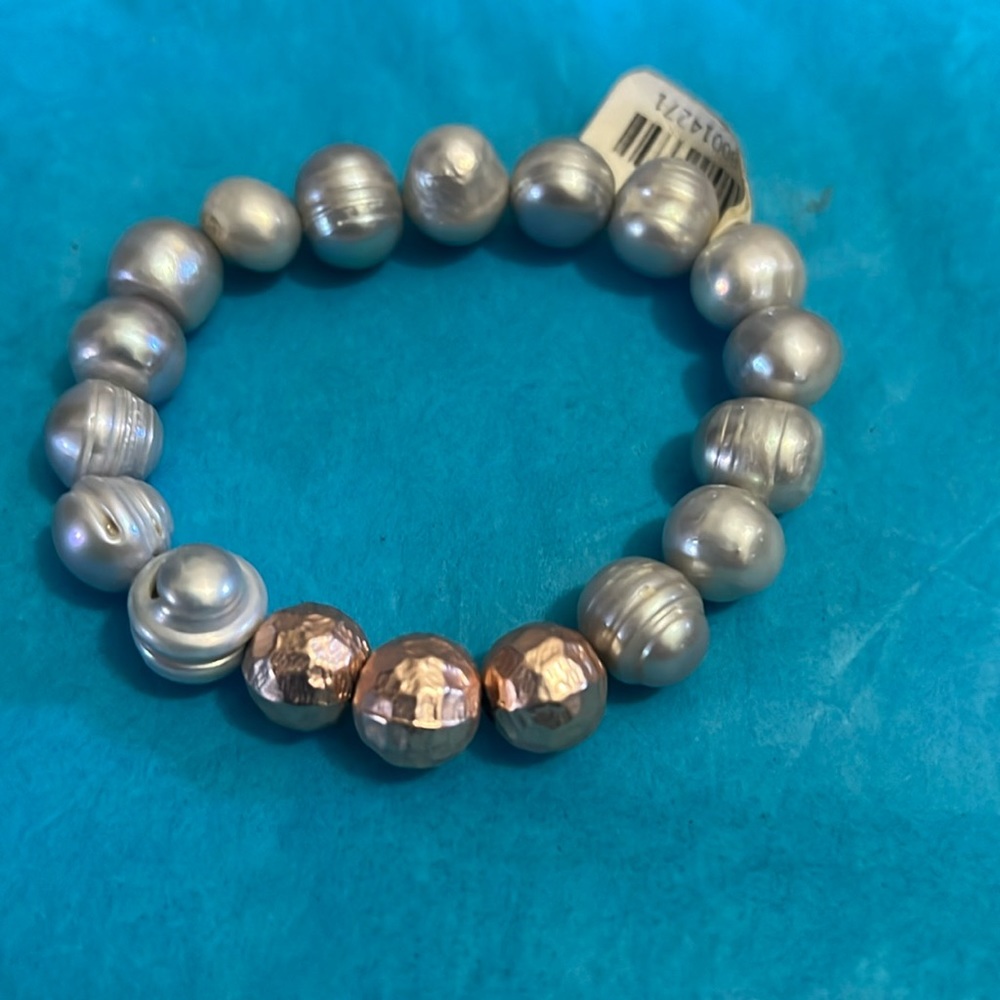 Silver and copper colored ball  stretch bracelet NWT